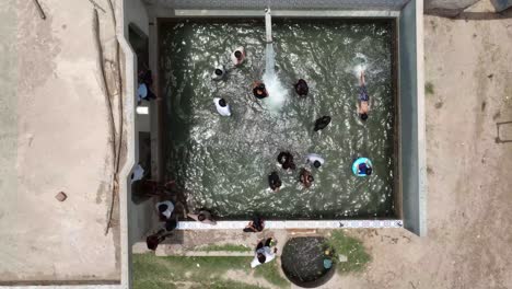 Aerial-View-of-Community-Pool-Fun,-Mirpurkhas-Sindh,-Pakistan