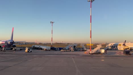 View-of-the-tarmac-with-transport-planes-preparing-for-departure