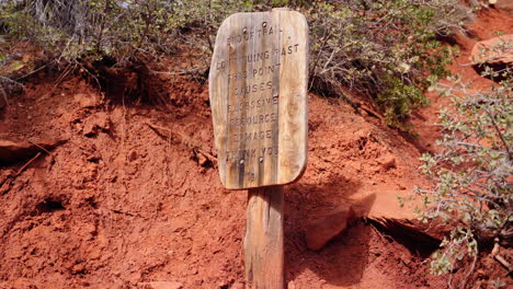 Sign-asking-hikers-to-stay-on-the-trail-to-minimize-environmental-damage-to-the-natural-resources
