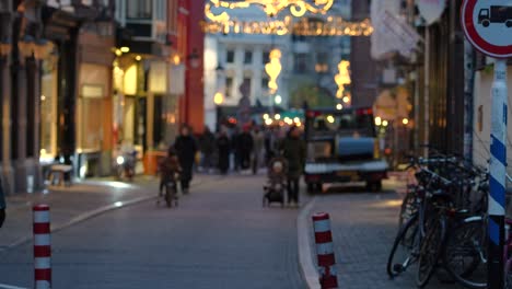 People-Walking-in-Traditional-Dutch-Street-During-Winter-in-December
