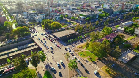 Aerial-view-of-the-Toesca-metro-station,-in-sunny-Deciocho,-Santiago-de-Chile