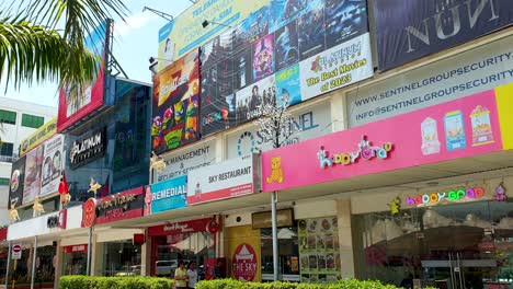 Exterior-facade-of-cinema-at-Timor-Plaza,-popular-entertainment-complex,-with-movie-posters,-in-capital-city-of-Dili,-Timor-Leste,-Southeast-Asia