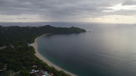 A-4K-drone-shot-of-Punta-Sabana-Point-and-the-Mirador-Conchal-Peninsula-next-to-Puerto-Viejo-and-Playa-Conchal,-or-“Shell-Beach”,-along-the-north-western-coast-of-Costa-Rica