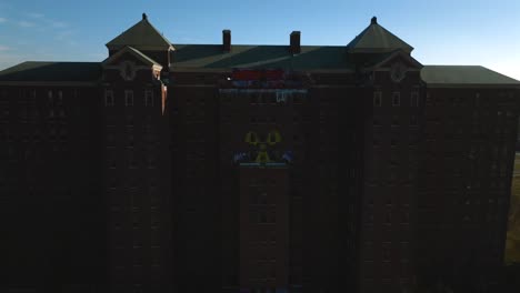 An-aerial-view-of-the-desolate-Kings-Park-Psychiatric-Center-on-a-sunny-day-on-Long-Island,-NY