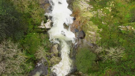 Famous-Fervenza-do-Toxa-Waterfalls-Over-Wild-Gorge-In-Pontevedra,-Galicia-Spain