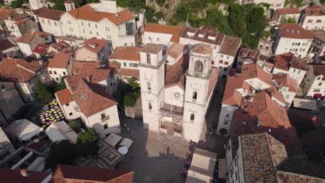Aerial-view-of-roman-catholic-Cathedral-of-Saint-Tryphon-in-Kotor,-Montenegro,-orbiting