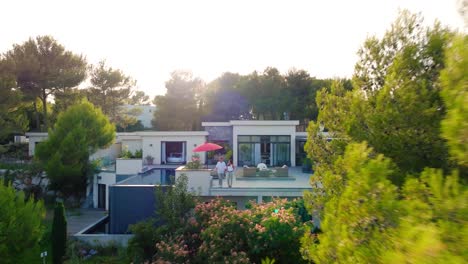 Couple-Enjoying-Luxury-Villa-Terrace-in-Saint-Gély,-Southern-France