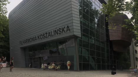 Filharmonia-Koszalinska-opera-house-in-Koszalin-city-in-Poland,-vertical-panning-shot