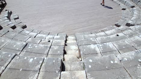 Descending-History:-Journeying-Down-the-Stone-Seats-Steps-of-Butrint's-Amphitheater,-Embracing-the-Archaeological-Marvels-of-this-Historic-Site