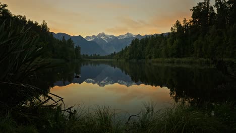 Reflection-sunset-on-smooth-surface-of-Lake-Matheson-with-mount-Cook
