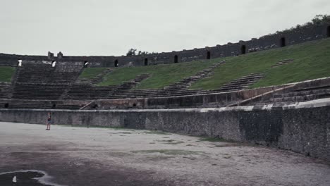 Inside-Pompeii's-amphitheater-stands,-Naples-Italy.-Panoramic-view