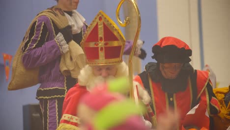 Sinterklaas-and-Petes-in-front-of-jumping-audience-close-up-slowmotion