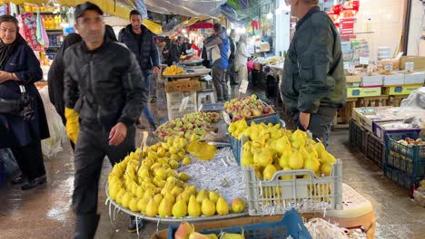 Local-farmer-market-fresh-fruits-grocery-store-in-a-old-city-people-life-cash-payment-and-pearl-fresh-organic-garden-woman-life-in-Iran-Rasht-gilan-city-northern-Iran-forest-and-rain-landscape-concept