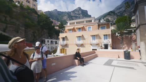 Amalfi-Positano-Italy-Immersive-Travel-Tourism-Mediterranean-Sea-Coast-Water-Europe,-Walking,-4K-|-Panorama-of-Tourist-Watching-Iconic-Mountainside-Cliffs-Near-Cathedral