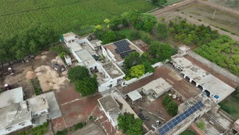 Solar-powered-rooftops-in-Badin-City,-Sindh,-Pakistan.-Aerial