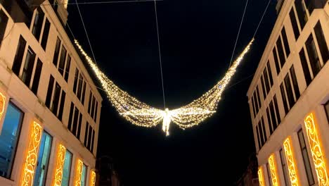 Christmas-Angel-static-sparkling-as-a-decoration-at-the-Berlin-Mall-in-Berlin,-Leipziger-Platz,-November-2023
