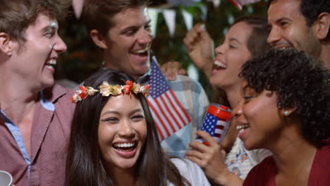 Portrait-Of-Friends-Celebrating-4th-Of-July-With-Party
