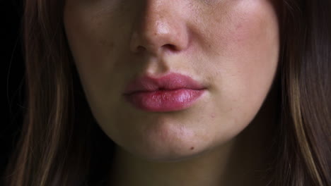 Close-Up-Of-Unhappy-Woman's-Lips-Trembling