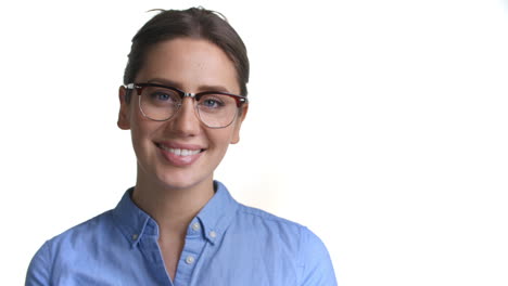 Close-Up-Of-Attractive-Woman-In-Glasses-Smiles-Into-Camera