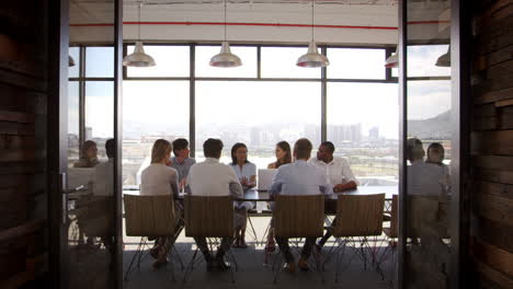 Creative-business-team-at-a-meeting-in-a-boardroom