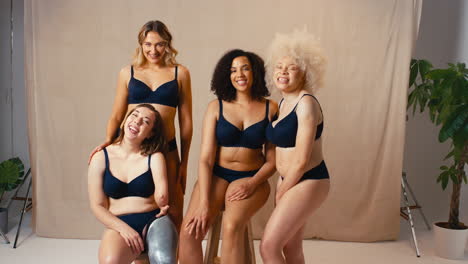 Group-Of-Women-Friends-One-With-Prosthetic-Limb-In-Underwear-Promoting-Body-Positivity-Dancing