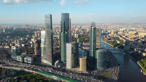 Aerial-Moscow-cityscape-with-business-centre-river-and-heavy-traffic