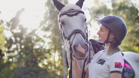 Horsewomen-has-a-favorite-hobby-in-her-life.-She-has-horse-friend-in-the-horse-club-she-stroking-her-horse-it-shows-love-and-tenderness.