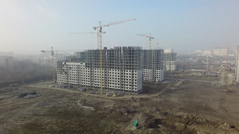 Residential-complex-with-high-rise-apartment-houses-under-construction-aerial