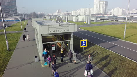 Aerial-shot-of-people-traffic-at-Kotelniki-subway-station-entry-Moscow