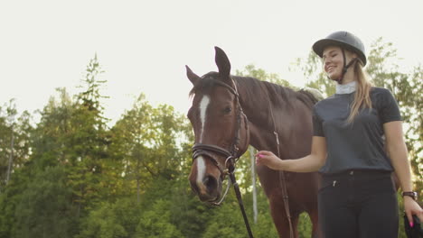 It's-a-cheerful-day-with-favorite-horse.-Women-is-walking-with-her-horse-in-the-horse-club.-This-is-a-sunny-day-with-warm-emotions-and-good-feelings.