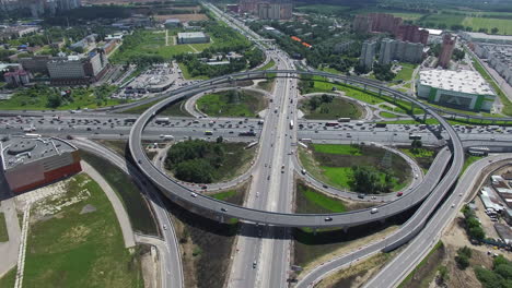 Cloverleaf-intersection-with-circular-overpass-aerial-view