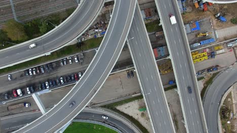 Aerial-shot-of-multilevel-road-intersection-over-rail-tracks-Moscow
