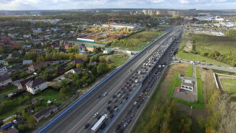 An-endless-traffic-jam-on-a-highway-in-the-middle-of-a-countryside-scenery