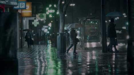 Weather-for-raincoats-and-umbrellas-Evening-street-of-Valencia-Spain