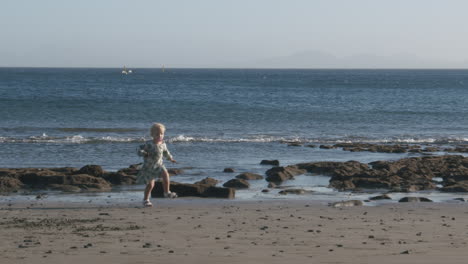 Little-girl-running-at-the-seaside