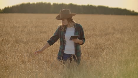 A-woman-farmer-with-tablet.-Smart-farming-and-digital-agriculture.