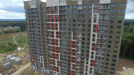 Aerial-view-of-new-apartment-house-built-far-from-the-city-dust