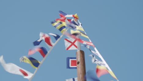 Small-flags-on-the-post-waving-in-the-wind