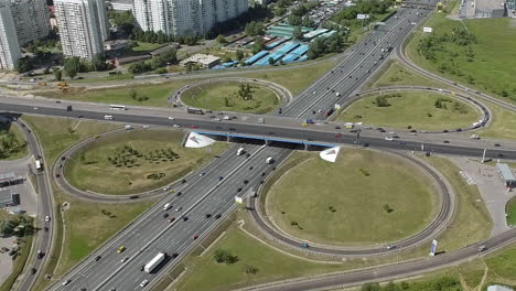 An-aerial-view-of-a-large-road-junction-on-a-sunny-day