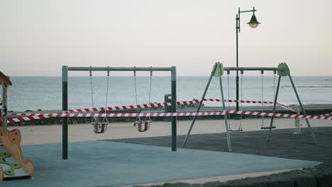 Empty-playground-with-warning-tapes-Coronavirus-restrictions