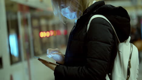 Gadget-addicted-woman-commuter-in-the-underground