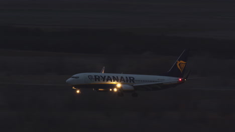 Night-view-of-Ryanair-aircraft-landing-at-Madrid-Barajas-airport