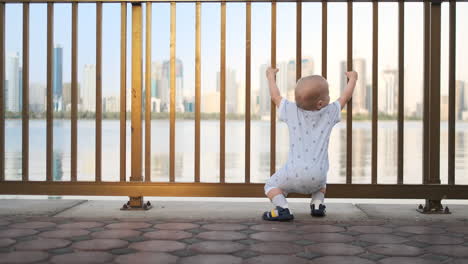 Laughing-boy-at-the-age-of-1-year-dancing.