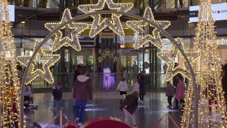 Children-making-freezing-effects-with-steps-on-interactive-floor-display