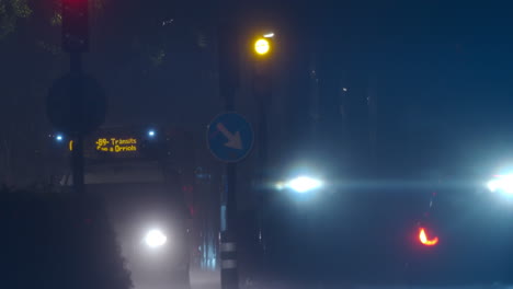 Rainy-night-and-road-traffic-with-bright-headlamps-lights