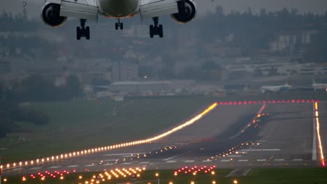 Slow-motion---airplane-lands-in-the-evening