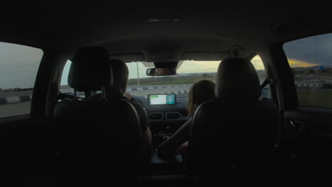 Father-and-son-are-driving-in-a-car