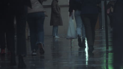 Feet-of-people-walking-on-the-road