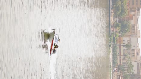 people-enjoying-their-time-by-paddling-and-boating-in-the-river-vertical-video