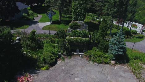 Cullen-Central-Park-in-Whitby,-Canada,-Aerial-Drone-Shot-Over-Old-Building